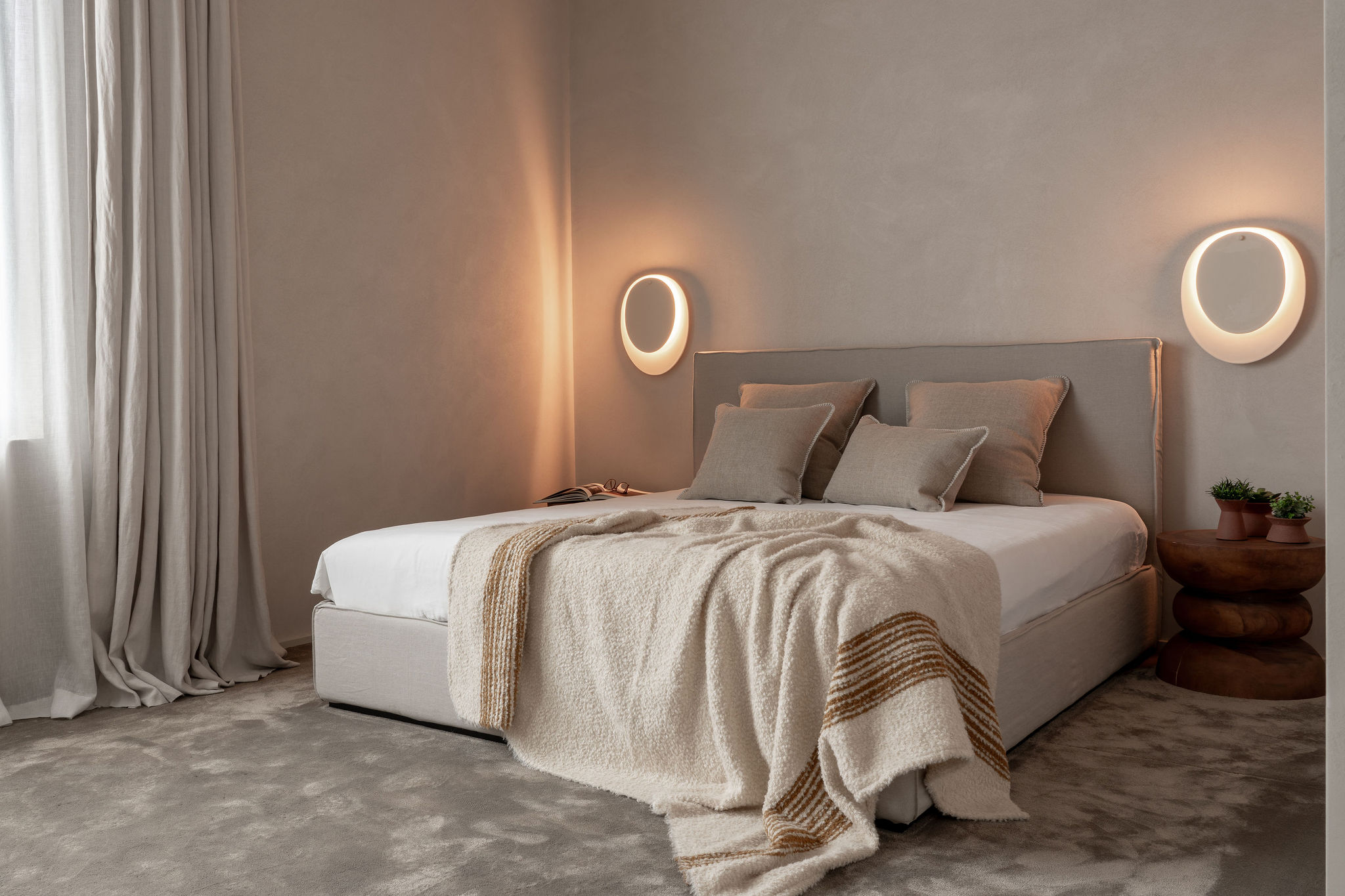Bed with linen headboard