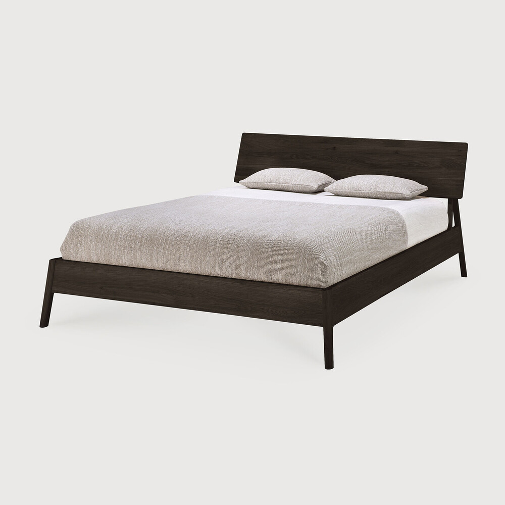 Dark brown oak bed